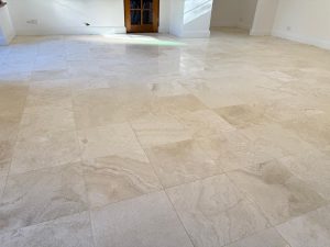 Restored travertine floor with polished finish in a Perth home